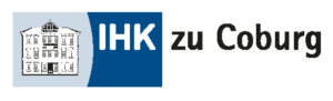 Logo der IHK zu Coburg. Es zeigt ein stilisiertes Gebäude auf hellblauem Hintergrund mit „IHK“ in fetten weißen Buchstaben auf einem blauen Rechteck, gefolgt von „zu Coburg“ in schwarzem Text. Dieses Emblem repräsentiert die Schnittstelle zwischen Elektrotechnik und Informatik und spiegelt Innovation und Technologie wider. at Hochschule Coburg